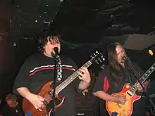 Van Conner (left) performing with Patrick Conner (right) in the band VALIS