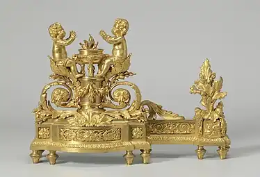 Firedog with putti that warm themselves at a flame; 1780–1790; gilt-bronze; height: 34.5 cm; Rijksmuseum
