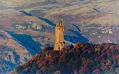 Image 14The Wallace Monument is a sandstone tower, built in the Victorian Gothic style. It stands on the summit of Abbey Craig, a volcanic crag above Cambuskenneth Abbey, from which Wallace was said to have watched the gathering of the army of English king Edward I, just before the Battle of Stirling Bridge.Photo credit: Ray Mann