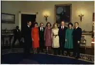 The incoming and outgoing first and second couples pose for a photograph at the White House on the day of the inauguration of Jimmy Carter. L-R:Vice President-elect Walter Mondale, incoming second lady Joan Mondale, outgoing Vice President Nelson Rockefeller, outgoing second lady Happy Rockefeller, Betty Ford, Gerald Ford, incoming first lady Rosalynn Carter, and President-elect Carter